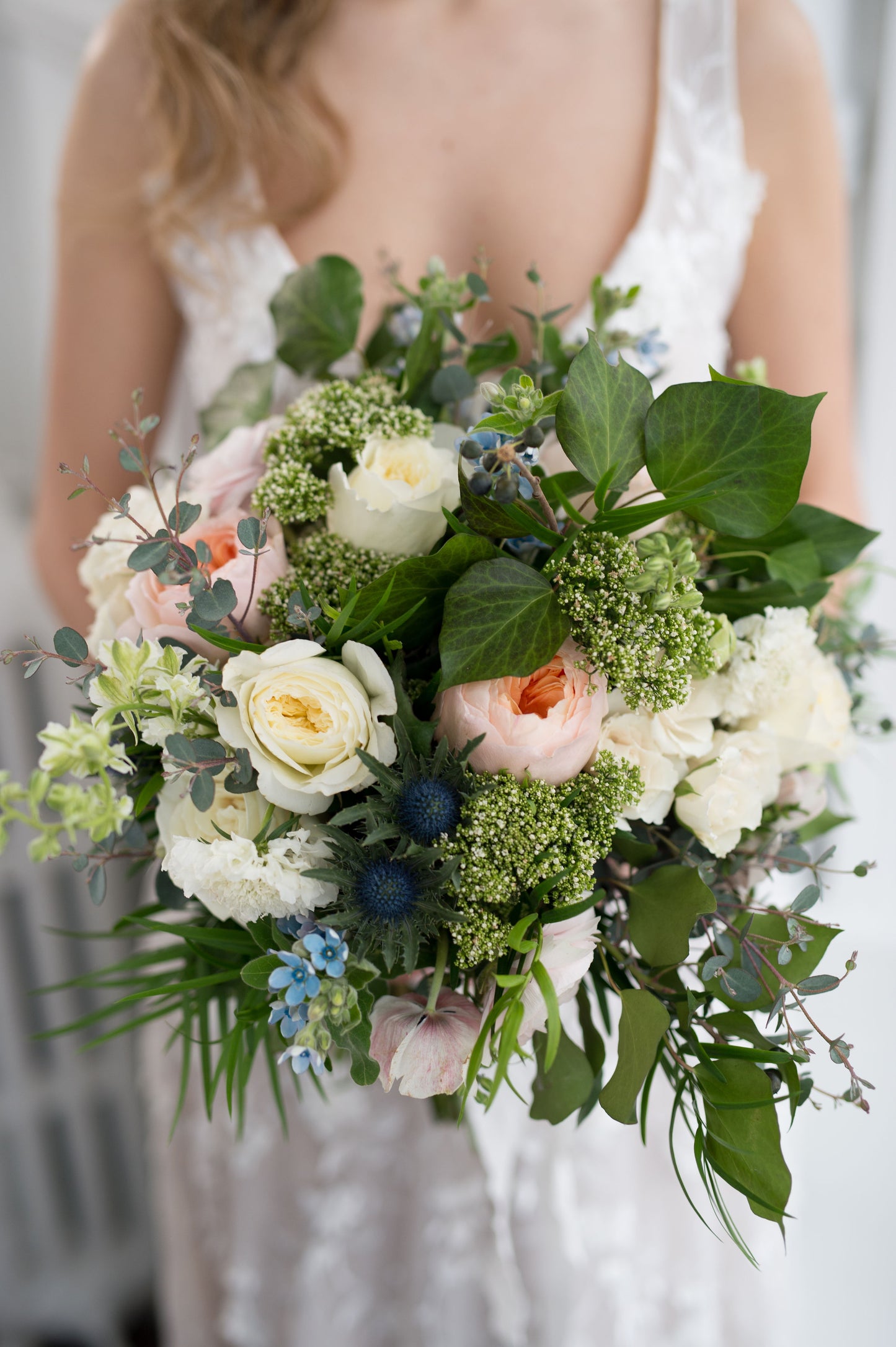An asymmetrical design, a lot of movement and depth between the flowers, placing each bloom on a different plane, so that the bouquet has an airy quality and feels more natural and freshly picked- The Flower Nook - Toronto Florist
