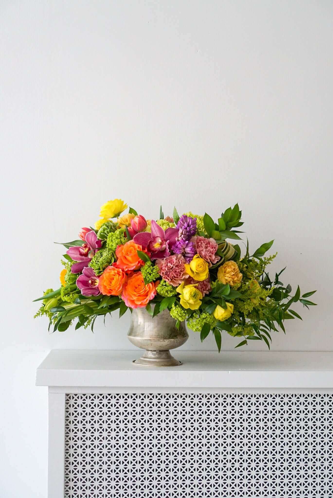 A sophisticated and tasteful arrangement for the fall season. The Autumn Festival filled with autumn elements include Free Spirit roses, dahlias, hyacinth, cymbidium orchids...The Flower Nook, Toronto Florist