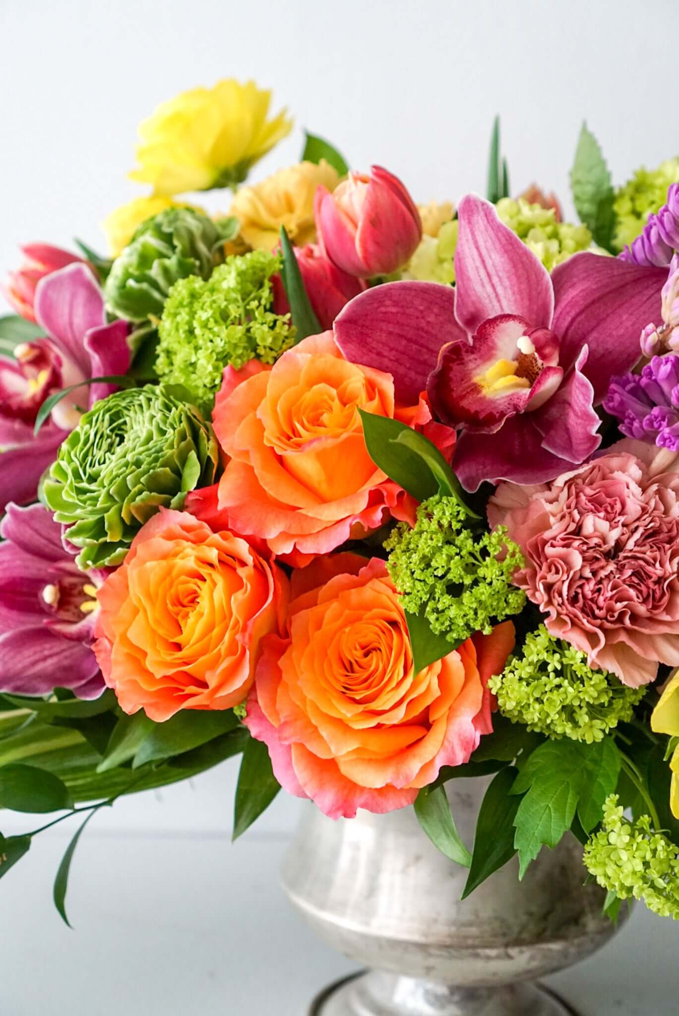 A sophisticated and tasteful arrangement for the fall season. The Autumn Festival filled with autumn elements include Free Spirit roses, dahlias, hyacinth, cymbidium orchids...The Flower Nook, Toronto Florist