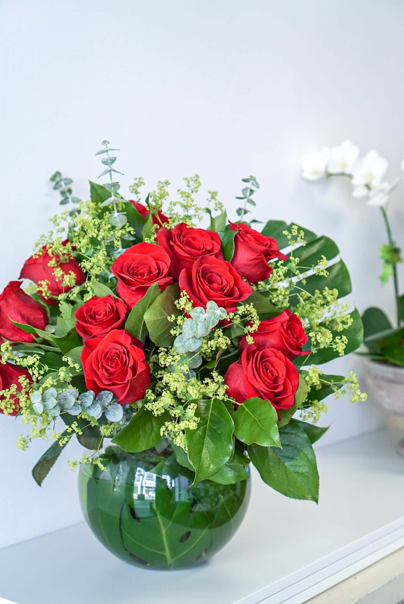 Sweetheart roses - A dozen of red roses and seasonal fillers in fish bowl vase. The Flower Nook - Toronto Florist