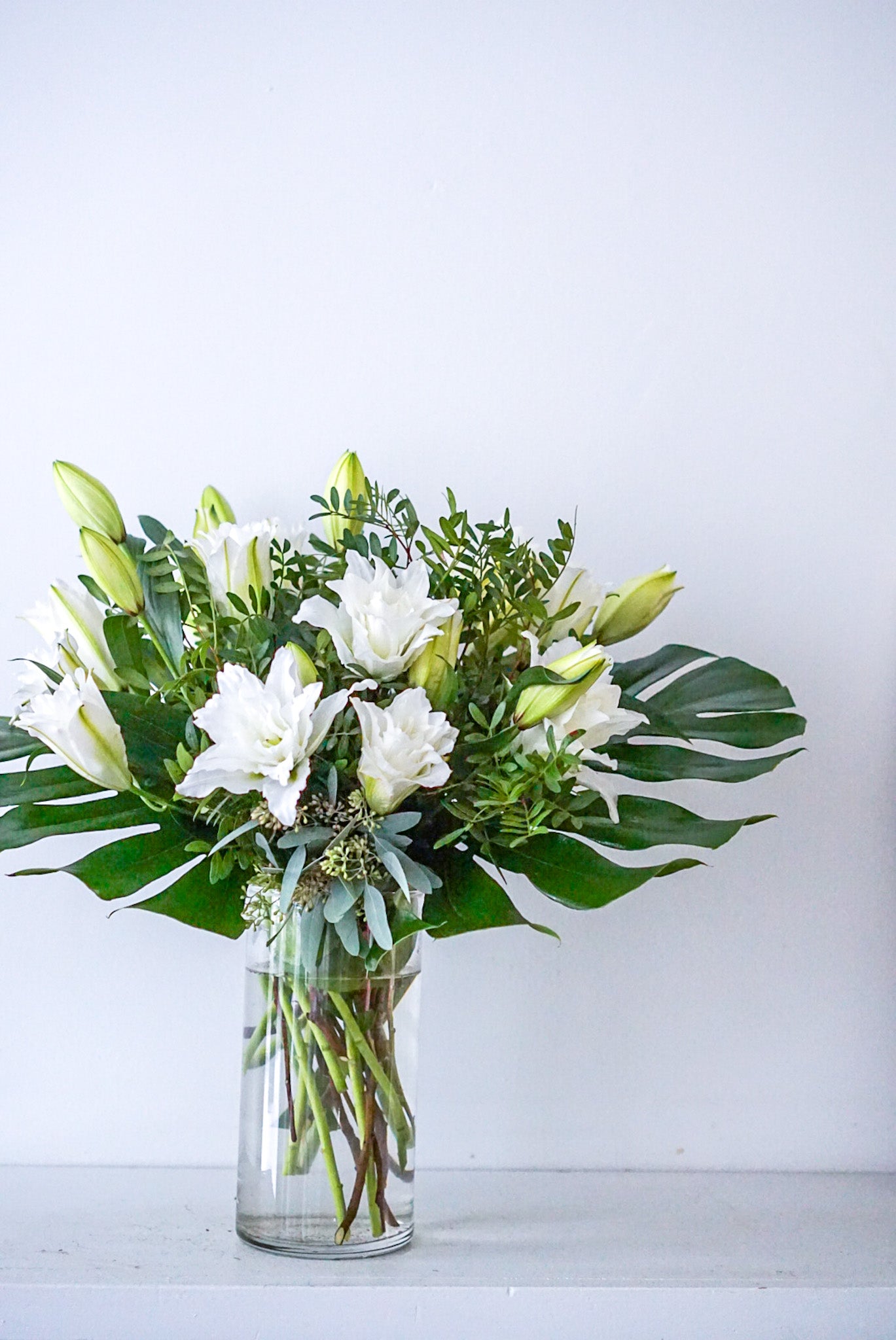 Sympathy Flowers - Lilies En Masse